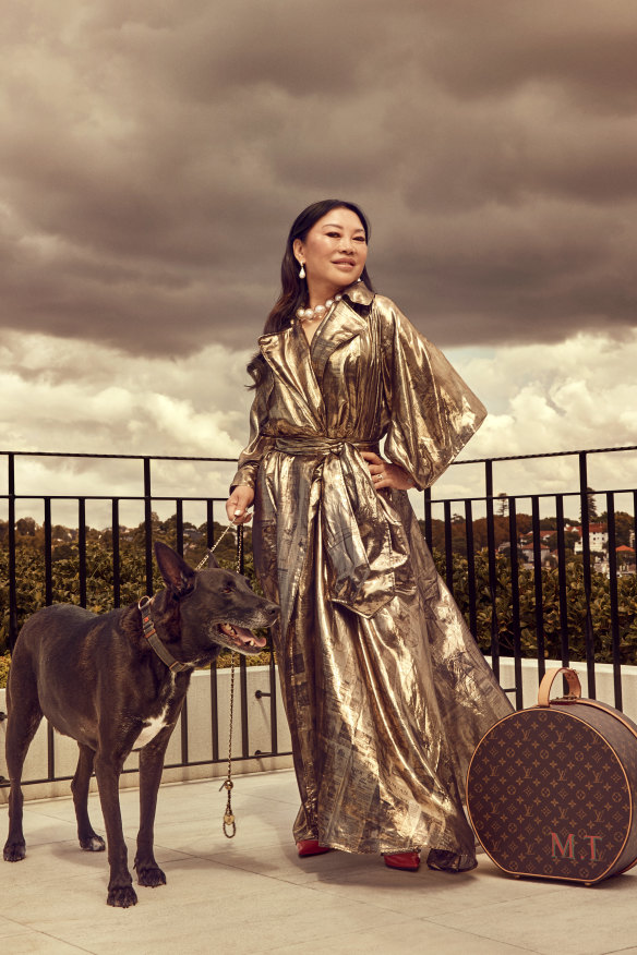 “I love luxury,” says Tu (pictured with Peanut, one of her two dogs), “because, why not? I work hard. I deserve something amazing, right?”