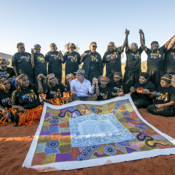 Prime Minister Anthony Albanese presented with a copy of the Uluru Statement from the Heart in 2023