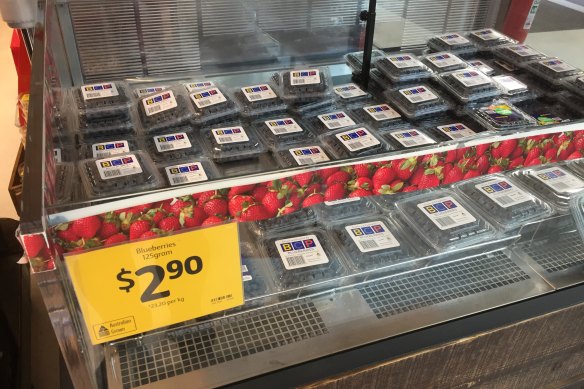Blueberries for sale in the strawberry display at Coles in Pyrmont.