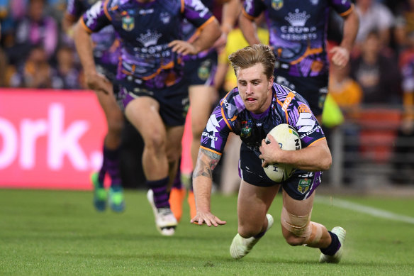 Cameron Munster of the Storm scores a try.