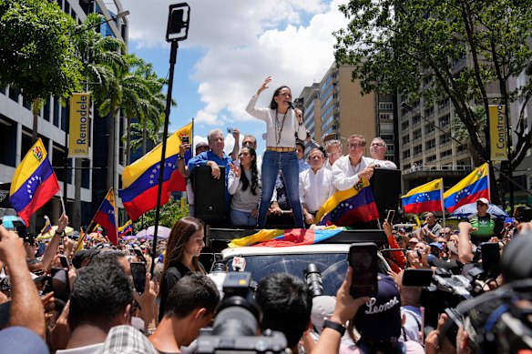 Maria Corina Machado leads a protest against the reelection of President Nicolás Maduro one month after the disputed presidential vote which she claims the opposition won by a landslide, in Caracas, Venezuela.