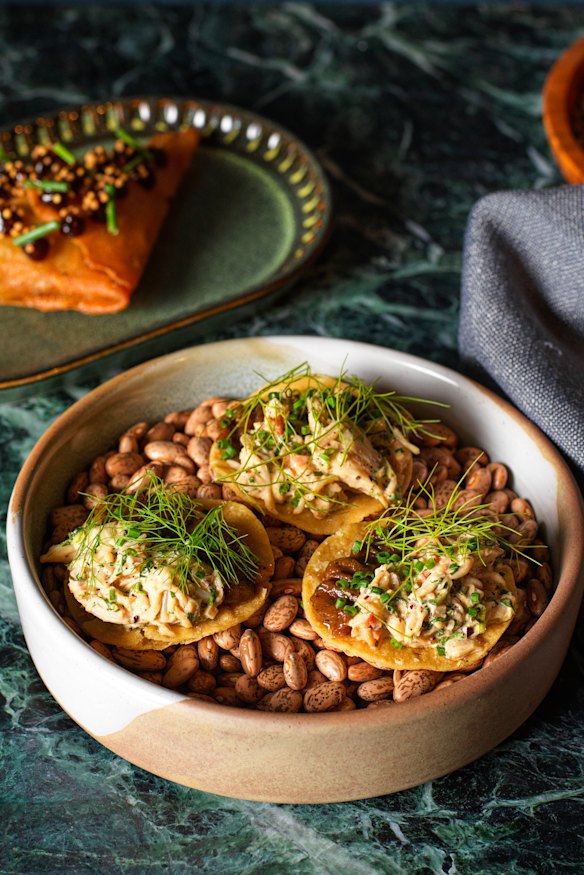 Salmon kibbeh neya with burghul, mint, sweet onions, Aleppo sambal and Lebanese bread.