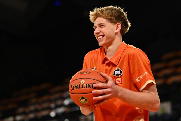  Luke Paul of the Taipans is seen warming up.