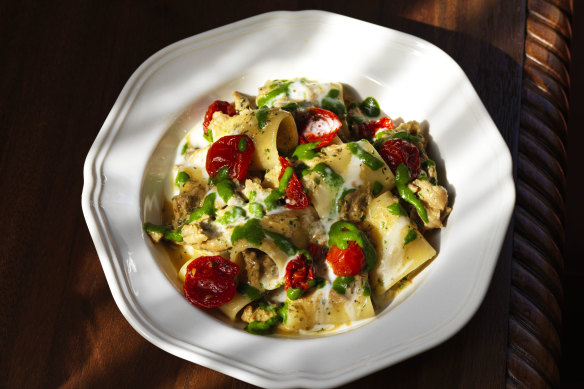 Mezzi paccheri with slow-cooked baby goat ragout, Meredith Dairy goat cheese, parsley and baby sun-dried tomatoes.