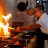 Co-founder and chef Raymond Hou works the new grill at Firepop, Enmore.