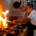 Co-founder and chef Raymond Hou works the new grill at Firepop, Enmore.