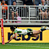 Esom Ioka of the Cook Islands crosses for a try.