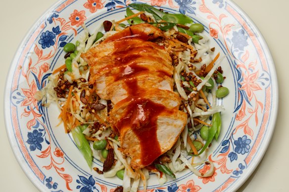 10-minute chicken served over cabbage and edamame salad.
