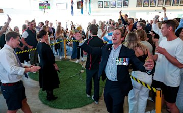 A crowd plays two-up at North Bondi RSL Club on Anzac Day last year.