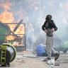 Anti-migration protesters during riots in Manvers, England, outside a hotel used as accommodation for asylum seekers.