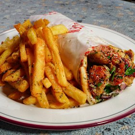 Greek souvlaki with chips are on the menu each Friday.