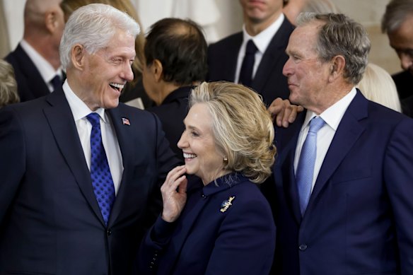 Former president Bill Clinton, former secretary of state Hillary Clinton, and former president George W. Bush.