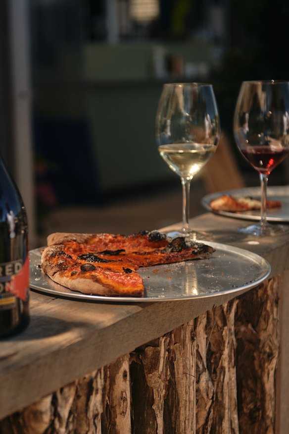 Stop by for a glass (and a slice of pizza) from Red Hill cellar door Quealy.
