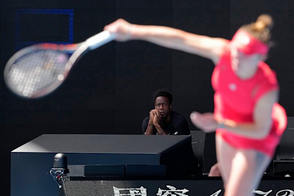 Gael Monfils watches his wife Elina Svitolina of Ukraine during her quarter-final against Madison Keys of the US.