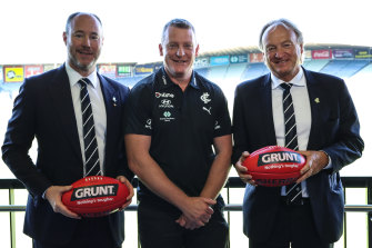 New order: Carlton senior coach Michael Voss (centre), president Luke Sayers (left) and CEO Brian Cook.