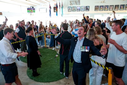 A crowd plays two-up at North Bondi RSL Club on Anzac Day last year.