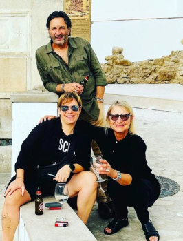 Stan Sarris with friend and blogger Vicky Munch, bottom left, and wife Judy Sarris, in Portugal recently.