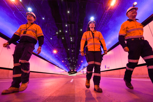 Mechanical and electrical manager Charles Giuttari (right) walks through the NorthConnex tunnel.
