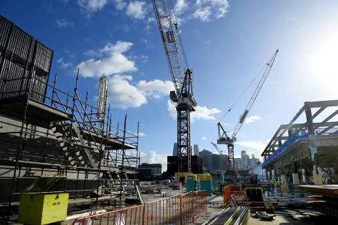 Construction workers at work on the site of the new Sydney Fish Market.