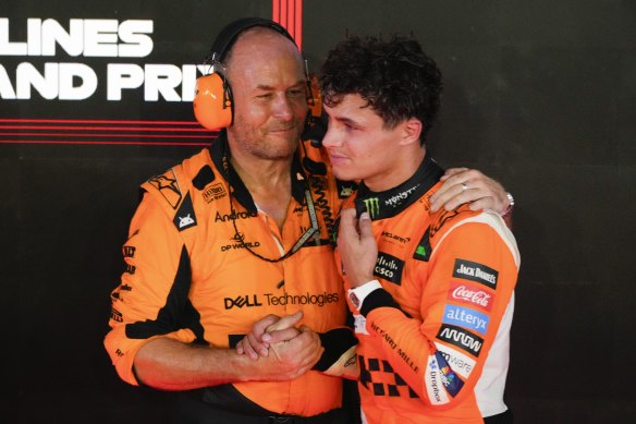 Norris (right) shows the effects of the 30-plus-degree temperatures in Singapore.