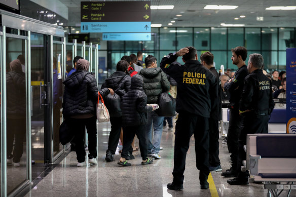Brazilians who were deported from US walk through the departure lounge at Eduardo Gomes International Airport in Manaus, Amazonas state, on January 25, 2025.