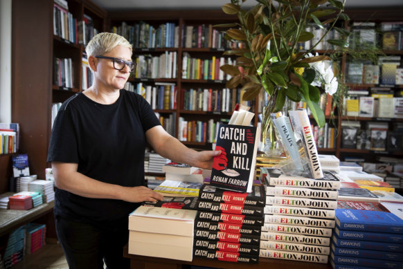 Anna Low, the owner, stacks the shelves at Potts Point Bookshop in 2019.