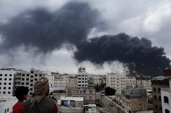Smoke billows across the skyline in Sanaa following Israel’s strike on the city’s international airport.