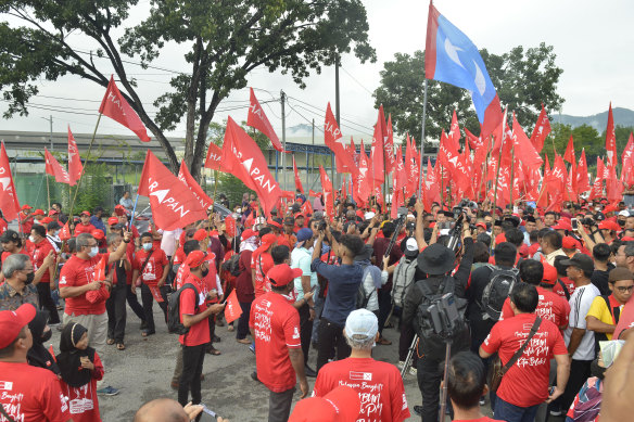 Supporters of Anwar and his Pakatan Harapan coalition gather at a campaign event on Saturday.