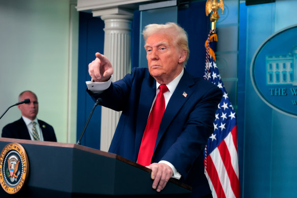 President Trump takes questions from reporters about the collision on Friday.