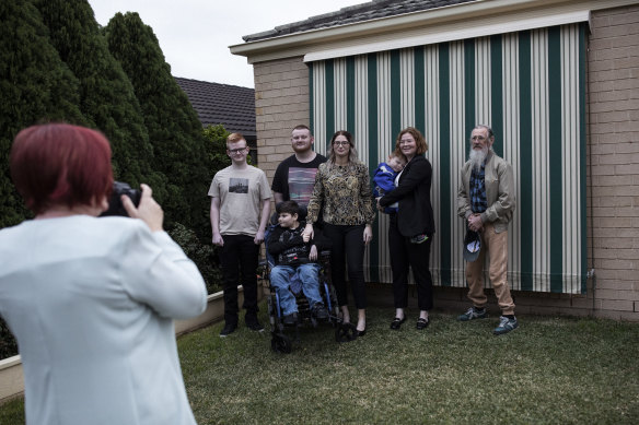 Farewells to family at Paige’s home in Metford, near Maitland the morning of her enlistment.
