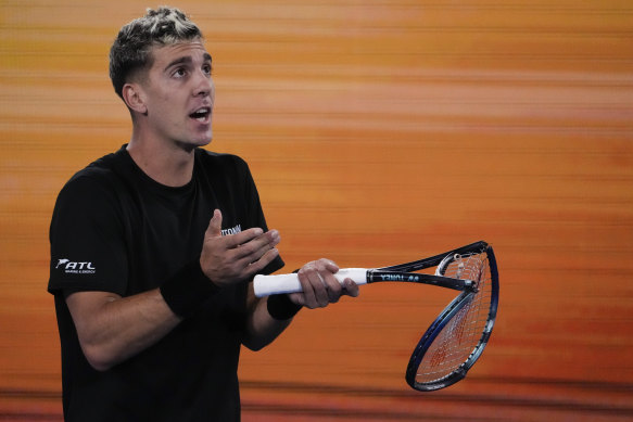 Thanasi Kokkinakis smashes his racquet after losing a point to Andy Murray. 