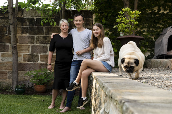 Kate Lorden with her teenage children Oliver and Liza Smith at home in Balmain.