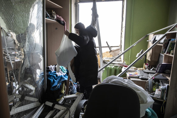 Alisa Petrova inside the bedroom of her family’s damaged apartment building after a rocket attack that hit a residential building in Kyiv. 