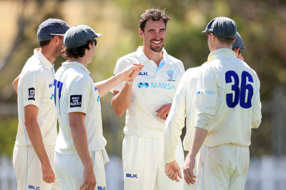 Mitchell Starc and the Blues celebrate a a wicket against Tasmania in a Shield clash in 2020.