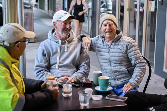 Fisher (right) says he no longer feels like a burden in social settings. 