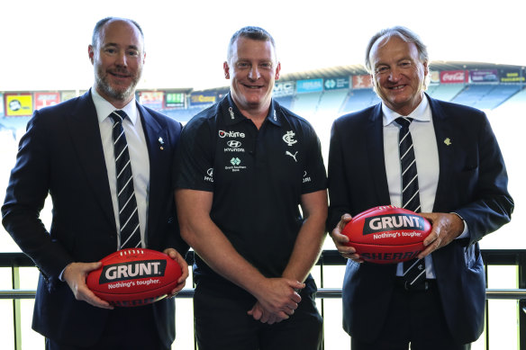 New order: Carlton senior coach Michael Voss (centre), president Luke Sayers (left) and CEO Brian Cook.