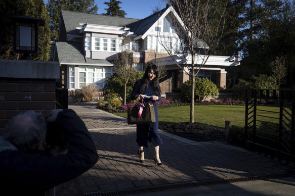 By contrast, in Vancouver, Meng Wanzhou, the chief financial officer of Huawei, stands in front of one of her two mansions, where she is under house arrest. She wears an electronic bracelet on her ankle and is free to travel around the city. 