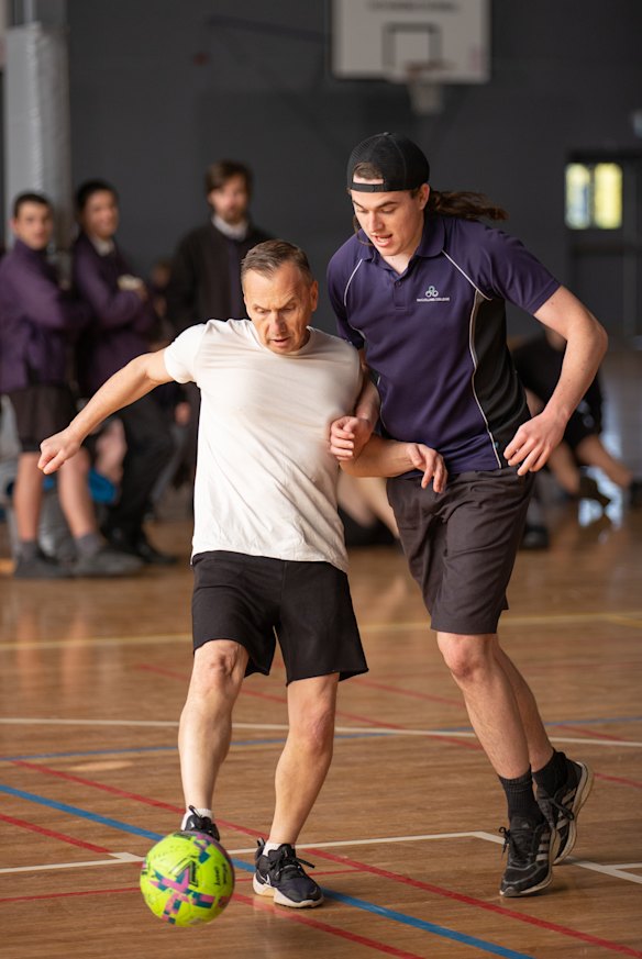 Principal Amadeo Ferra joined teachers squaring off with students for their weekly contest.