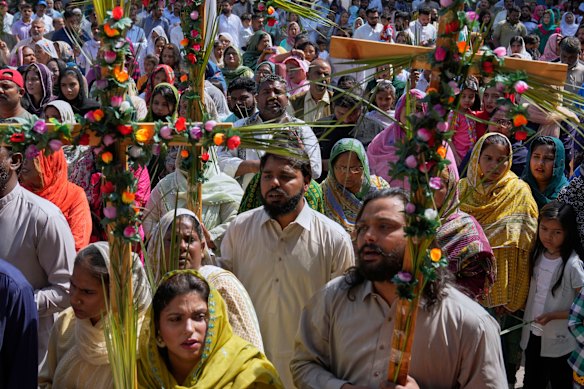 Pakistani Christians attend a Palm Sunday Mass in St. Anthony Church in Lahore, Pakistan.