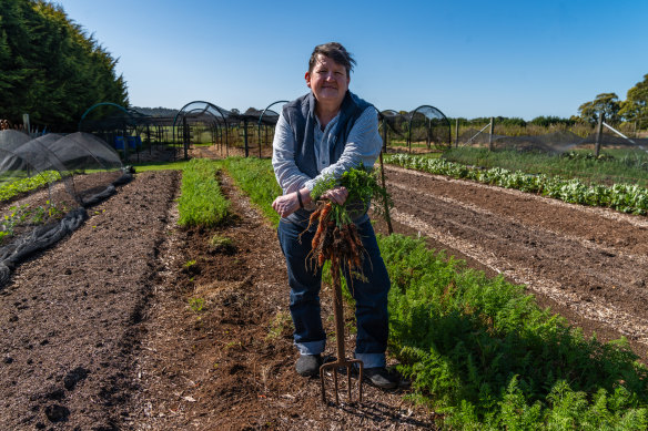 Du Fermier owner-chef Annie Smithers in her Lyonville vegetable garden.