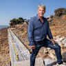 Gene Neill was building a seawall to stop erosion, but admits he didn’t have a permit.