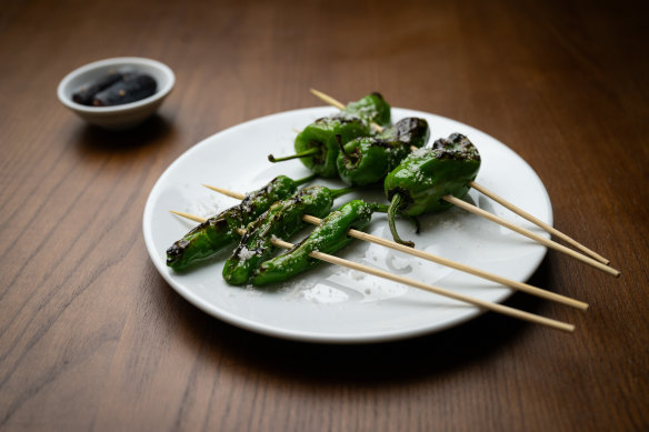 Shishito and padron peppers on skewers: beware the occasional super-hot one.