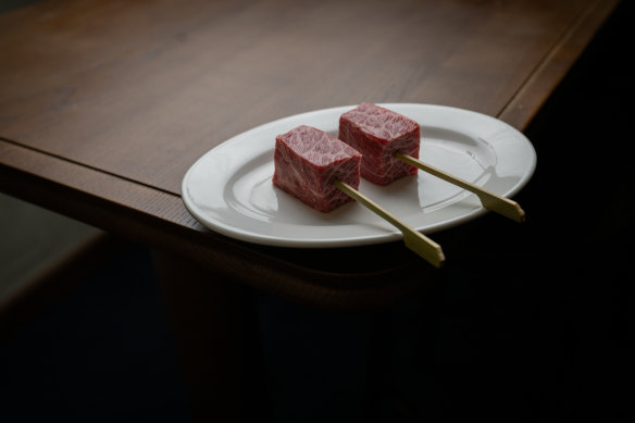 The deeply marbled wagyu cubes before cooking.