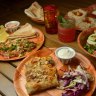 Spiced lamb cigars and chilli snapper with dips and salad.