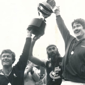 Carlton coach, David Parkin, captain, Mike Fitzpatrick and veteran champion, Bruce Doull, give a combined victory salute after winning the 1982 VFL Grand Final.