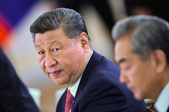 Chinese President Xi Jinping (left) with Foreign Minister Wang Yi in Moscow in May.
