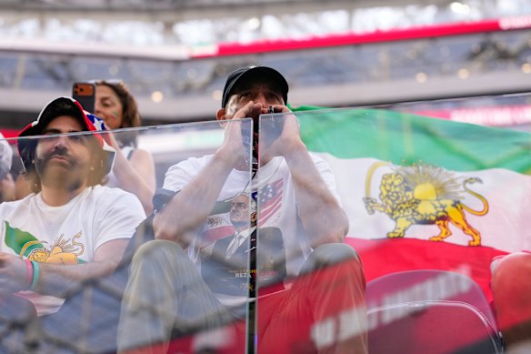 A man shouts before the World Cup Group G soccer match between Iran and New Zealand.