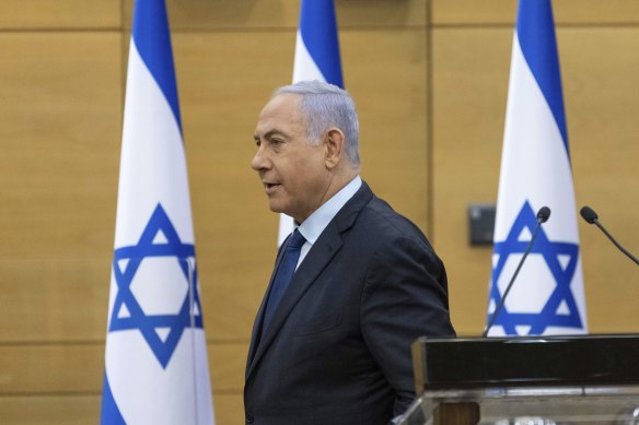 Not leaving just yet: Israeli Prime Minister Benjamin Netanyahu in the Israeli parliament on Sunday.