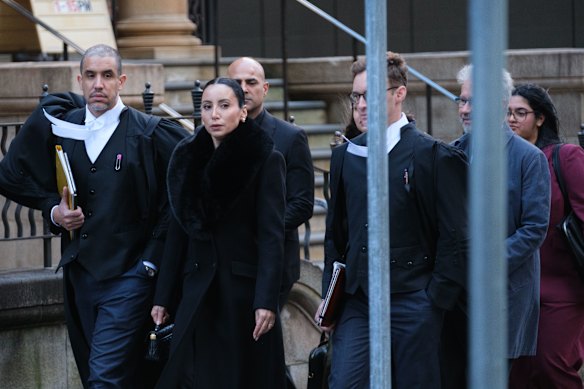 Antoinette Lattouf and her legal team outside the Federal Court in Sydney on Wednesday.