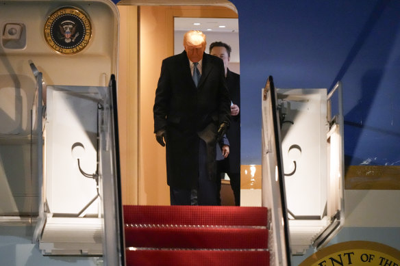 President Donald Trump, followed by  Musk, alights Air Force One at a Maryland air base last week.